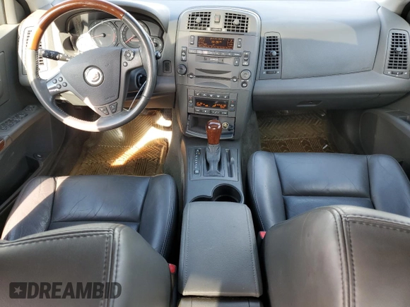 2003 Cadillac CTS with VIN 1G6DM57N430133534, listed as a Copart auction lot 72477954 with 131,181 mi miles and Salvage Title. Bid and sale history available at carsss.com. Image 8.