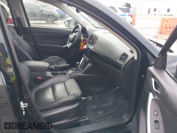 2014 Mazda CX-5 Grand Touring with VIN JM3KE4DY5E0373731, listed as a IAAI auction lot 41517852 with 148,414 mi miles. Bid and sale history available at carsss.com. Image 5.