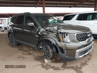 2023 Kia Telluride SX Prestige X-Line z VIN 5XYP5DGC5PG407971, wystawiony jako IAAI lot #41578334 z przebiegiem 50 481 mil mil oraz . Historia ofert i sprzedaży dostępna na DreamBid. Obrazek 1.