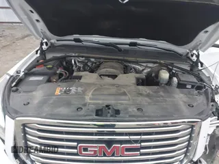 2018 GMC Yukon SLT with VIN 1GKS1BKC3JR279163, listed as a IAAI auction lot 40973940 with 122,445 mi miles. Bid and sale history available at carsss.com. Image 10.