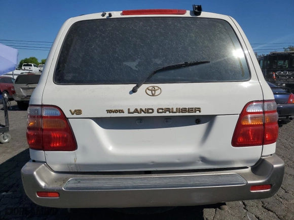 1999 Toyota Land Cruiser with VIN JT3HT05J0X0059222, listed as a Copart auction lot 77713294 with 406,869 mi miles and Clean Title. Bid and sale history available at carsss.com. Image 6.
