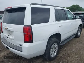 2018 Chevrolet Tahoe LT with VIN 1GNSCBKC0JR356276, listed as a IAAI auction lot 41961957 with 120,429 mi miles and . Bid and sale history available at DreamBid. Image 4.
