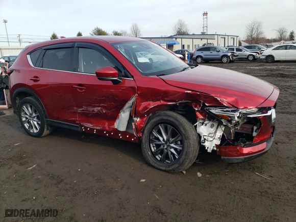 2021 Mazda CX-5 Grand Touring with VIN JM3KFBDM2M0434594, listed as a Copart auction lot 43135775 with 33,736 mi miles and Salvage Title. Bid and sale history available at carsss.com. Image 4.