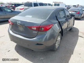 2016 Mazda Mazda3 i Sport with VIN JM1BM1U7XG1302989, listed as a IAAI auction lot 41828899 with NaN miles. Bid and sale history available at carsss.com. Image 4.
