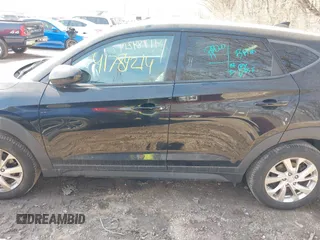 2019 Hyundai Tucson SE with VIN KM8J2CA4XKU852946, listed as a IAAI auction lot 41784214 with 120,857 mi miles. Bid and sale history available at carsss.com. Image 14.