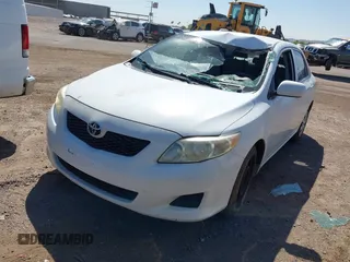 2009 Toyota Corolla with VIN JTDBL40E699058755, listed as a IAAI auction lot 42564996 with 211,526 mi miles and . Bid and sale history available at DreamBid. Image 2.