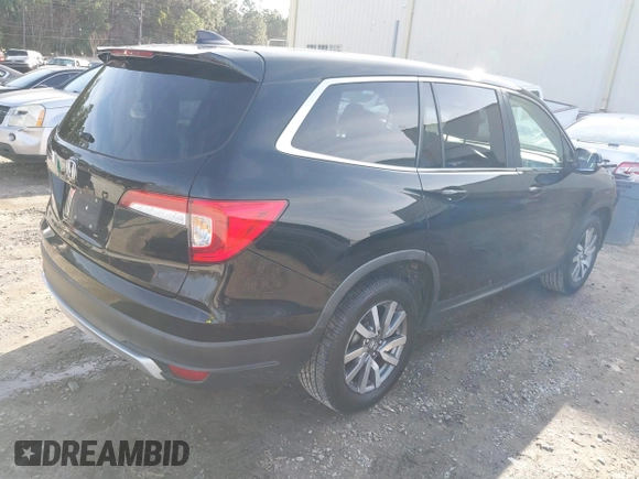 2020 Honda Pilot EX-L with VIN 5FNYF5H52LB003289, listed as a IAAI auction lot 41563075 with 151,682 mi miles. Bid and sale history available at carsss.com. Image 4.