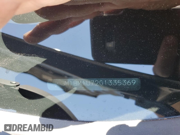 2016 Mazda 3 i Sport with VIN JM1BM1U72G1335369, listed as a Copart auction lot 56196025 with 167,105 mi miles and Salvage Title. Bid and sale history available at DreamBid. Image 13.