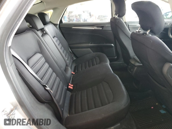 2013 Ford Fusion SE Hybrid z VIN 3FA6P0LU2DR104182, wystawiony jako Copart lot #63107545 z przebiegiem 249 317 mil mil oraz Szkoda całkowita • Salvage title. Historia ofert i sprzedaży dostępna na DreamBid. Obrazek 10.