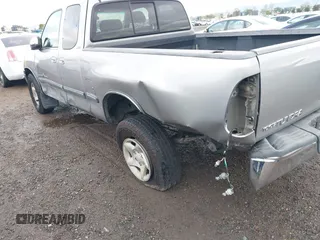 2001 Toyota Tundra SR5 with VIN 5TBRT341X1S204718, listed as a IAAI auction lot 41760173 with 233,734 mi miles and . Bid and sale history available at DreamBid. Image 6.