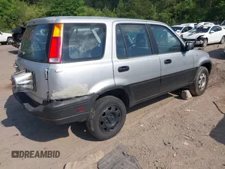 1998 Honda CR-V LX with VIN JHLRD2841WC018466, listed as a IAAI auction lot 42142021 with 184,505 mi miles. Bid and sale history available at carsss.com. Image 4.