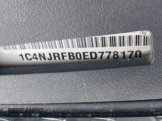 2014 Jeep Patriot Latitude with VIN 1C4NJRFB0ED778170, listed as a IAAI auction lot 41870418 with 54,624 mi miles. Bid and sale history available at carsss.com. Image 9.