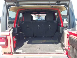 2018 Jeep Wrangler Unlimited Sport S z VIN 1C4HJXDGXJW168940, wystawiony jako IAAI lot #42200607 z przebiegiem 60 308 mil mil oraz . Historia ofert i sprzedaży dostępna na DreamBid. Obrazek 17.