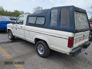 1985 Ford Ranger with VIN 1FTCR10S8FUA23702, listed as a IAAI auction lot 42017521 with 12,320 mi miles and . Bid and sale history available at DreamBid. Image 3.