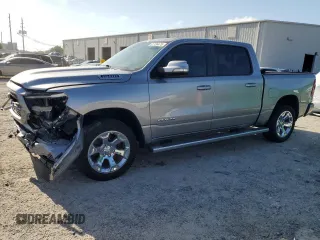2019 Ram 1500 Big Horn with VIN 1C6RRFFG2KN674930, listed as a Copart auction lot 61736475 with 102,904 mi miles and Salvage title. Bid and sale history available at DreamBid. Image 1.