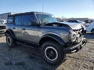 2021 Ford Bronco with VIN 1FMEE5DP9MLA89837, listed as a Copart auction lot 87672995 with 27,341 mi miles and Salvage Title. Bid and sale history available at DreamBid. Image 4.