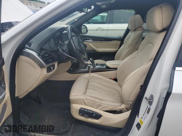 2017 BMW X5 xDrive35i with VIN 5UXKR0C56H0V68771, listed as a Copart auction lot 59587015 with 164,990 mi miles and Salvage title. Bid and sale history available at DreamBid. Image 7.