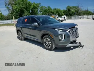 2022 Hyundai Palisade SEL z VIN KM8R24HE2NU472785, wystawiony jako Copart lot #53363865 z przebiegiem 46 150 mil mil oraz Szkoda całkowita • Salvage title. Historia ofert i sprzedaży dostępna na DreamBid. Obrazek 14.