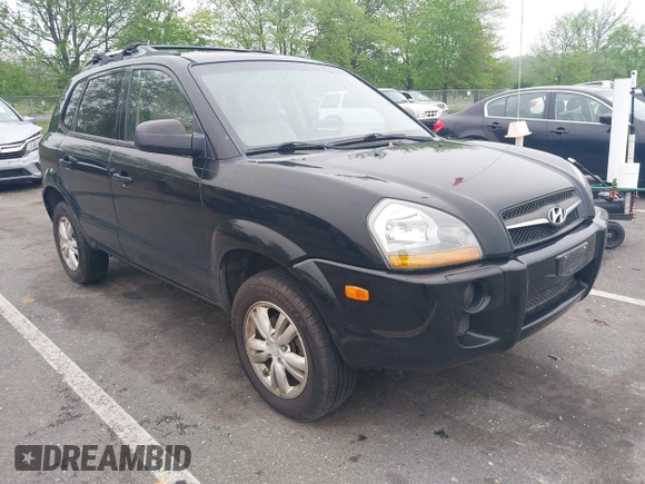 2009 Hyundai Tucson GLS with VIN KM8JM12B59U990027, listed as a IAAI auction lot 42195935 with 170,875 mi miles. Bid and sale history available at carsss.com. Image 1.