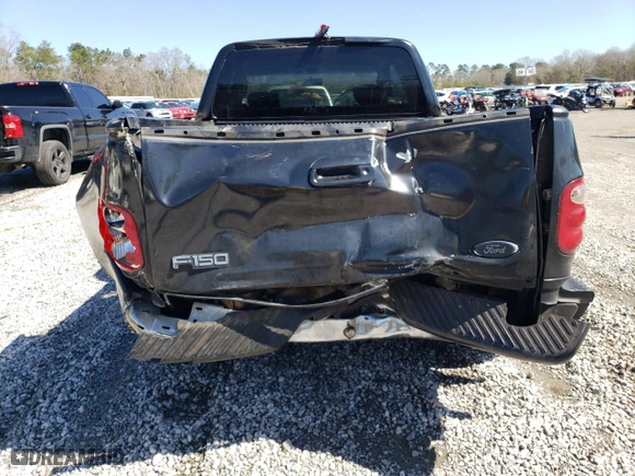 2002 Ford F-150 XL with VIN 1FTRX07252KC90074, listed as a Copart auction lot 48565215 with 0 mi miles and Salvage Title. Bid and sale history available at carsss.com. Image 6.