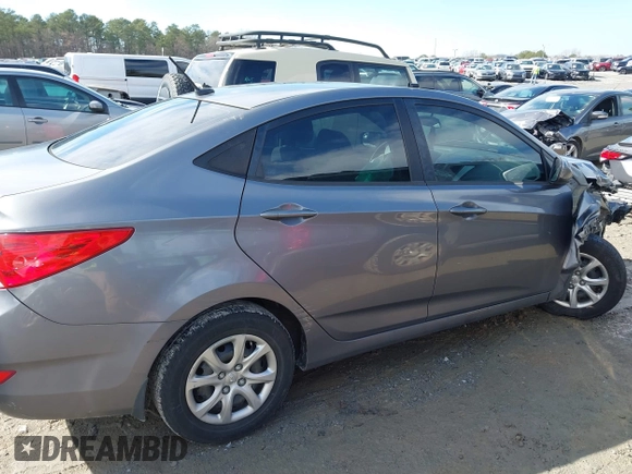 2014 Hyundai Accent GLS with VIN KMHCT4AEXEU710606, listed as a IAAI auction lot 41764163 with 103,859 mi miles. Bid and sale history available at carsss.com. Image 13.