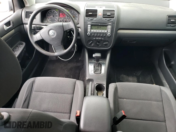 2009 Volkswagen Rabbit S с VIN WVWDA71K49W079965, выставлен на аукционе Copart как лот 55434955 с пробегом 140 529 миль миль и Списание • Salvage title. История ставок и продаж доступна на DreamBid. Изображение 8.