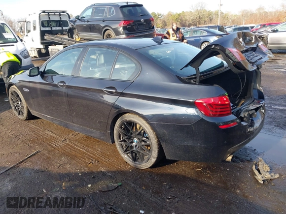 2015 BMW 5 Series 535i xDrive with VIN WBA5B3C56FD540699, listed as a IAAI auction lot 41128002 with 97,726 mi miles and . Bid and sale history available at DreamBid. Image 3.