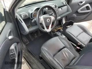 2008 Smart fortwo Pure z VIN WMEEJ31X58K178519, wystawiony jako Copart lot #52978925 z przebiegiem 50 975 mil mil oraz Szkody całkowita. Historia ofert i sprzedaży dostępna na DreamBid. Obrazek 8.
