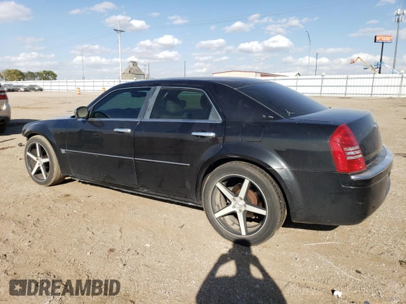 2006 Chrysler 300 C with VIN 2C3KA63H06H272552, listed as a Copart auction lot 72185684 with 105,737 mi miles and Salvage Title. Bid and sale history available at carsss.com. Image 2.