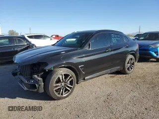 2020 BMW X4 M with VIN 5YMUJ0C00LLU67178, listed as a Copart auction lot 73831723 with 36,724 mi miles. Bid and sale history available at carsss.com. Image 1.