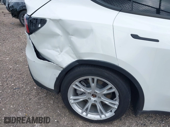 2022 Tesla Model Y Long Range with VIN 7SAYGDEE3NF380067, listed as a IAAI auction lot 41016704 with 52,180 mi miles and . Bid and sale history available at DreamBid. Image 22.