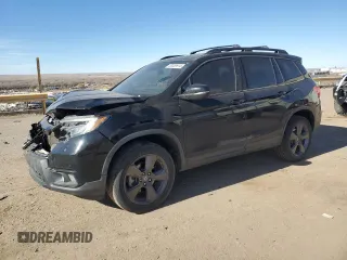 2019 Honda Passport Touring z VIN 5FNYF8H9XKB027293, wystawiony jako Copart lot #86569914 z przebiegiem 124 238 mil mil oraz Szkoda całkowita • Salvage title. Historia ofert i sprzedaży dostępna na DreamBid. Obrazek 1.