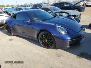 2020 Porsche 911 Carrera with VIN WP0AA2A96LS205552, listed as a Copart auction lot 52935275 with 32,994 mi miles and Salvage Title. Bid and sale history available at carsss.com. Image 4.