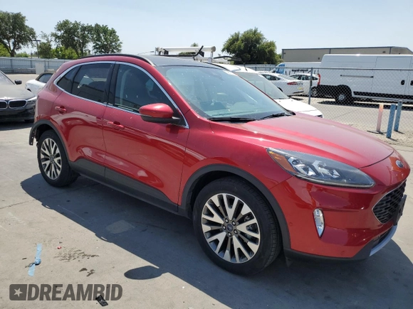 2020 Ford Escape Titanium with VIN 1FMCU9J98LUA58109, listed as a Copart auction lot 59397735 with 31,334 mi miles and Salvage title. Bid and sale history available at DreamBid. Image 4.