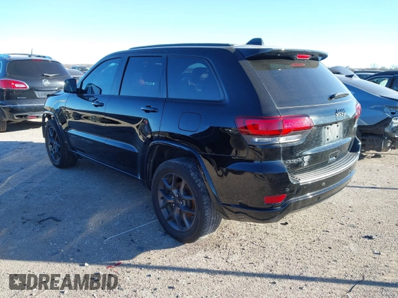 2021 Jeep Grand Cherokee 80th Anniversary with VIN 1C4RJFBG9MC527654, listed as a IAAI auction lot 41212055 with 92,436 mi miles and . Bid and sale history available at DreamBid. Image 3.