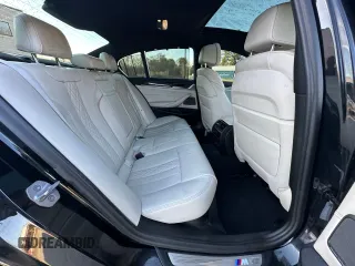 2018 BMW 5 Series M550i xDrive with VIN WBAJB9C55JB035226, listed as a Copart auction lot 50197815 with 156,183 mi miles and Clean title. Bid and sale history available at DreamBid. Image 6.