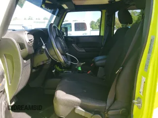2016 Jeep Wrangler Unlimited Sport with VIN 1C4BJWDG8GL335001, listed as a Copart auction lot 53081785 with 91,533 mi miles and Salvage Title. Bid and sale history available at DreamBid. Image 7.