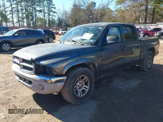 2003 Dodge Dakota SLT with VIN 1D7HL48X03S174569, listed as a IAAI auction lot 41159169 with 156,551 mi miles. Bid and sale history available at carsss.com. Image 2.