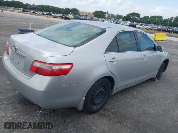 2007 Toyota Camry CE with VIN 4T1BE46K97U621990, listed as a IAAI auction lot 41907054 with 136,067 mi miles. Bid and sale history available at carsss.com. Image 4.