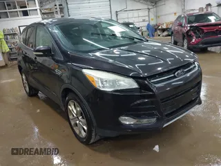 2013 Ford Escape SEL z VIN 1FMCU9HX4DUC84640, wystawiony jako IAAI lot #42516739 z przebiegiem 111 919 mil mil oraz . Historia ofert i sprzedaży dostępna na DreamBid. Obrazek 1.