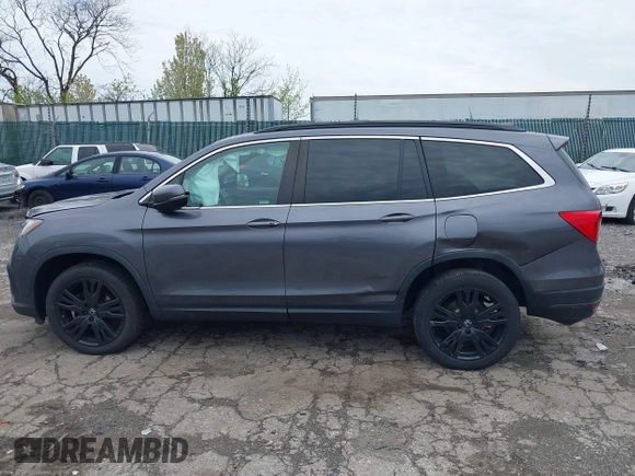 2021 Honda Pilot Special Edition with VIN 5FNYF6H25MB078596, listed as a IAAI auction lot 42033012 with 70,467 mi miles and . Bid and sale history available at DreamBid. Image 14.