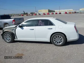 2014 Chrysler 300 with VIN 2C3CCAEG4EH312930, listed as a IAAI auction lot 41907509 with 128,940 mi miles. Bid and sale history available at carsss.com. Image 14.