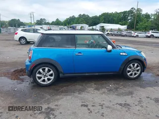 2010 MINI Hardtop S with VIN WMWMF7C55ATW88946, listed as a IAAI auction lot 42443200 with 104,953 mi miles and . Bid and sale history available at DreamBid. Image 13.
