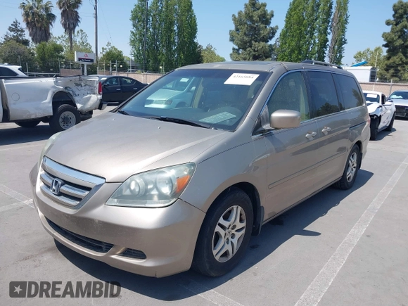 2005 Honda Odyssey EX-L with VIN 5FNRL38705B087733, listed as a IAAI auction lot 42165084 with 254,357 mi miles. Bid and sale history available at carsss.com. Image 6.