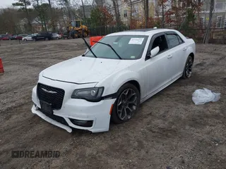 2018 Chrysler 300 with VIN 2C3CCABG5JH244829, listed as a IAAI auction lot 41726654 with 156,131 mi miles. Bid and sale history available at carsss.com. Image 2.