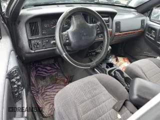 1997 Jeep Grand Cherokee Laredo with VIN 1J4GZ58S5VC720174, listed as a Copart auction lot 44169635 with Not provided miles and Salvage title. Bid and sale history available at DreamBid. Image 8.