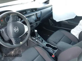 2019 Toyota Corolla L with VIN 5YFBURHEXKP934032, listed as a IAAI auction lot 41247557 with 95,560 mi miles. Bid and sale history available at carsss.com. Image 5.