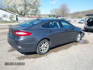 2016 Ford Fusion SE with VIN 3FA6P0H76GR312783, listed as a IAAI auction lot 42049628 with 217,005 mi miles. Bid and sale history available at carsss.com. Image 4.