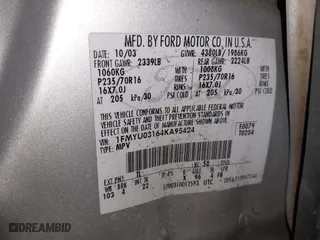 2004 Ford Escape XLT with VIN 1FMYU03164KA95424, listed as a IAAI auction lot 41810929 with 229,539 mi miles. Bid and sale history available at carsss.com. Image 9.