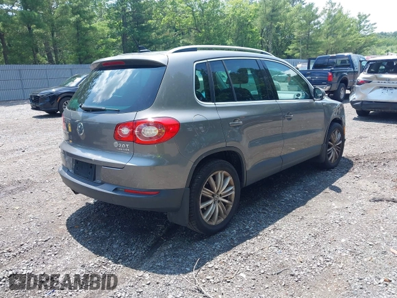 2010 Volkswagen Tiguan S with VIN WVGBV7AX1AW532415, listed as a IAAI auction lot 42561683 with 106,147 mi miles and . Bid and sale history available at DreamBid. Image 4.